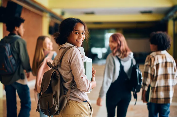 young girl going back to school.