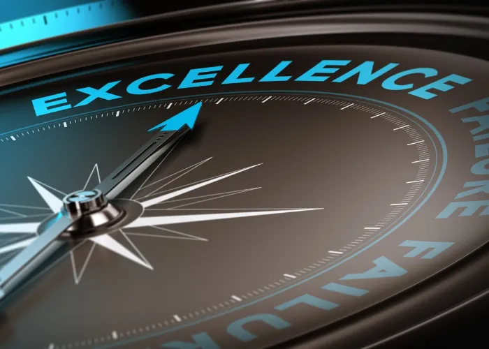 Compass with focus on the word excellence. Quality service concept suitable for motivational poster or header of a website. Blue and black tones