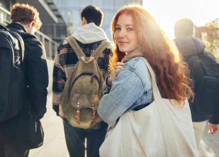 Female student going for class in high school